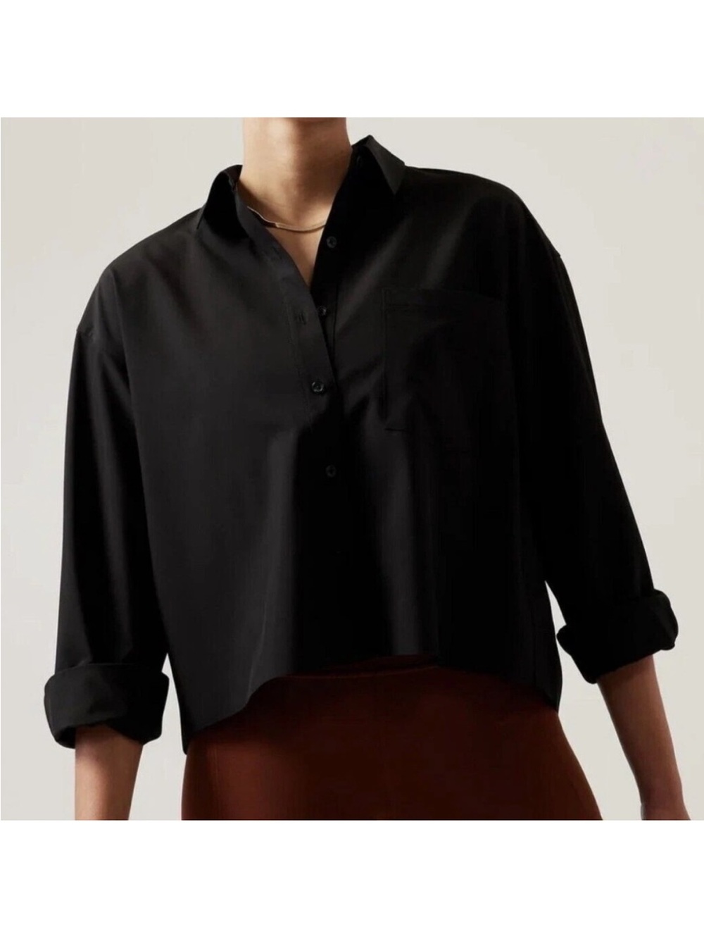 Athleta black cropped stretch tech top size M